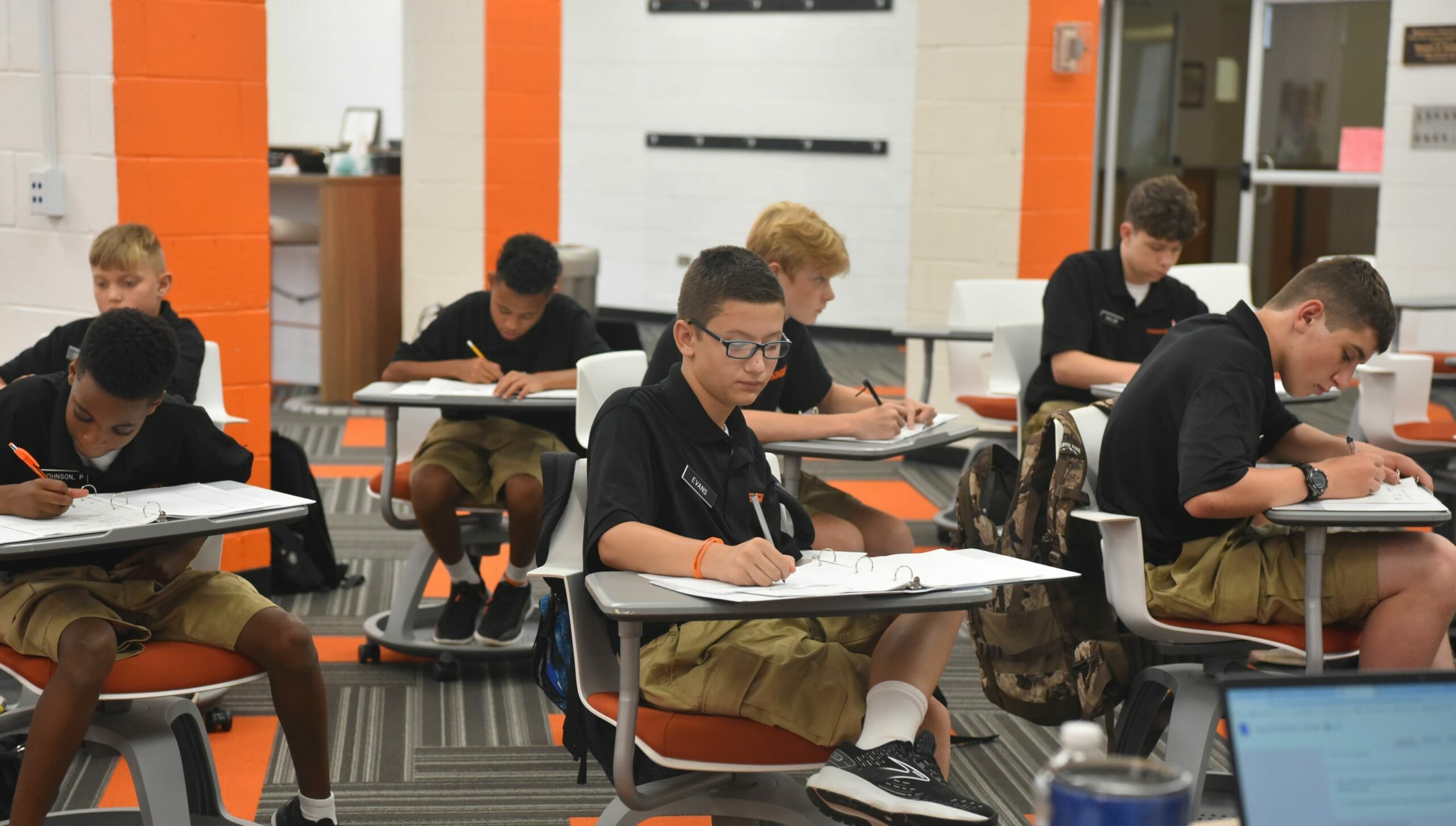 Cadets in classroom in desks.