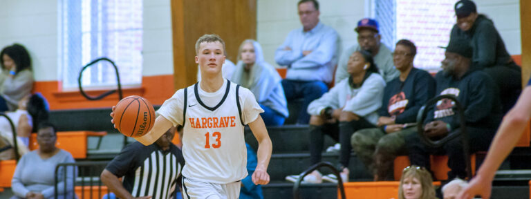 Cadet dribbling up the court.