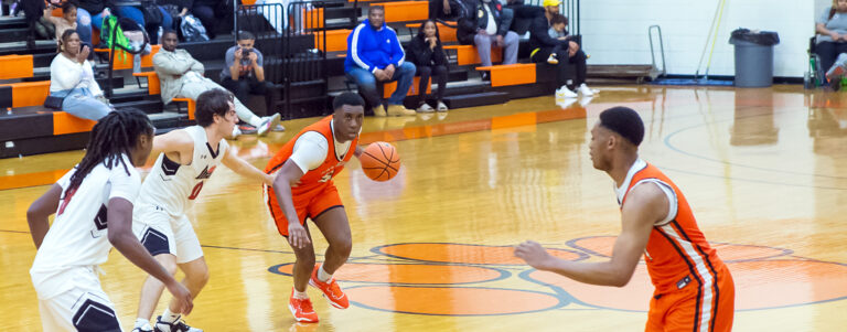Player dribbling ball during game.