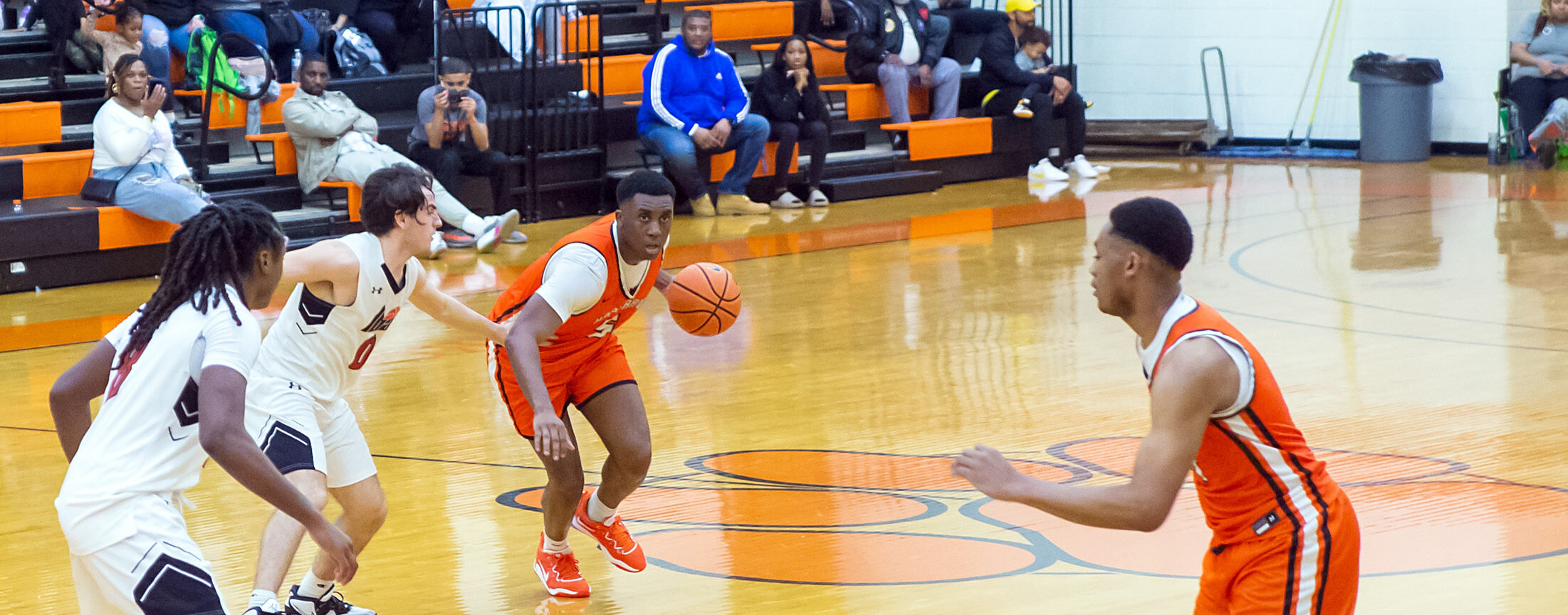 Player dribbling ball during game.
