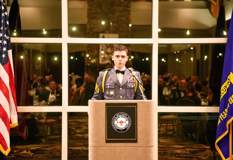 Hargrave cadet addresses banquet gathering.